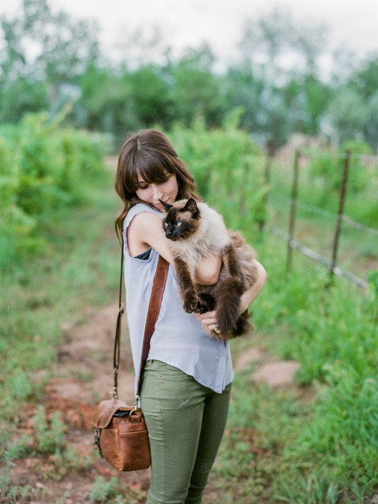 Girl With Cute Cat In Nature